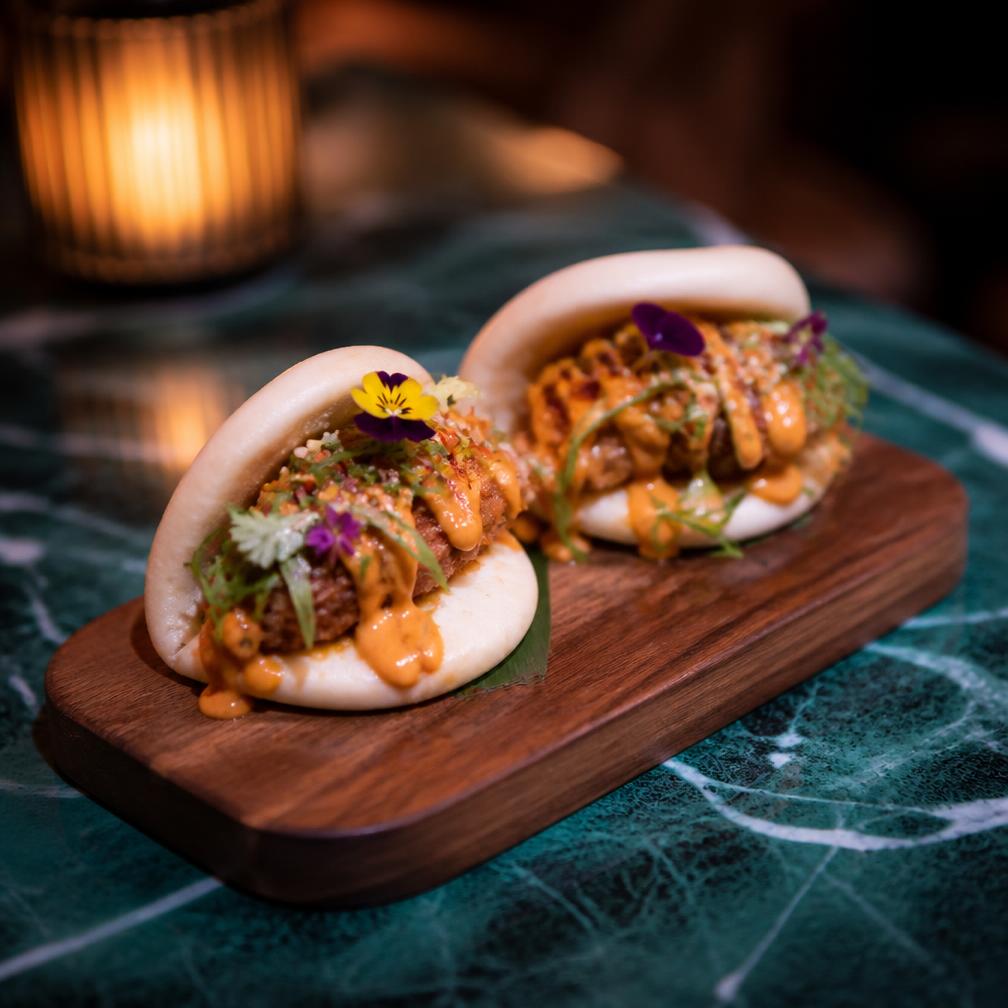 Spicy bao buns with edible flowers