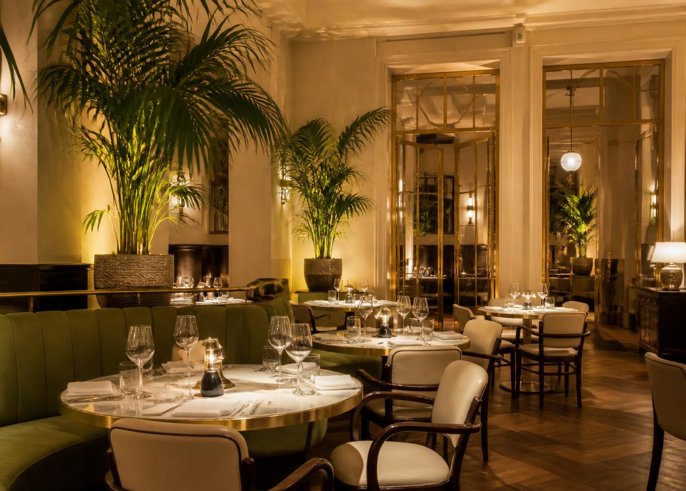 Marble dining room with olive banquettes